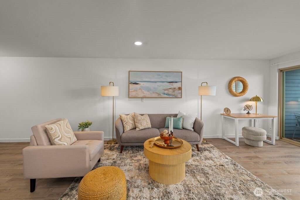 Photo of 3200 W Commodore Way #107, Seattle, WA 98199 (MLS # 2356405)