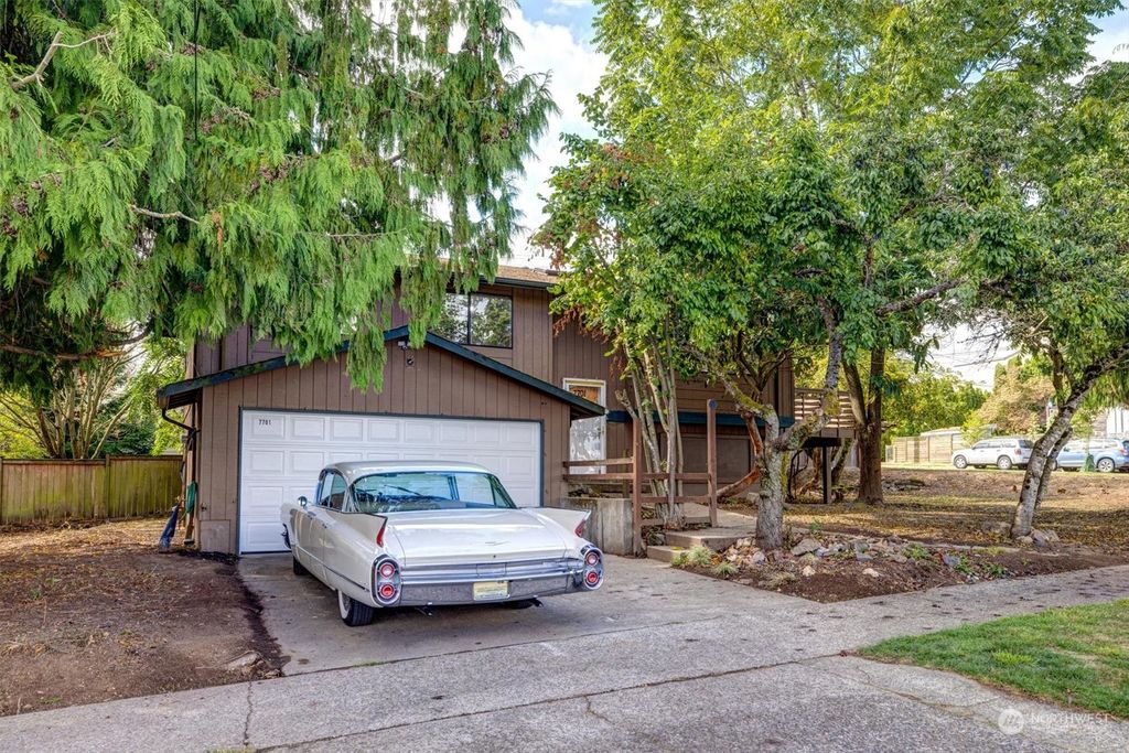 Photo of 7701 34TH Avenue SW, Seattle, WA 98126 (MLS # 2311446)