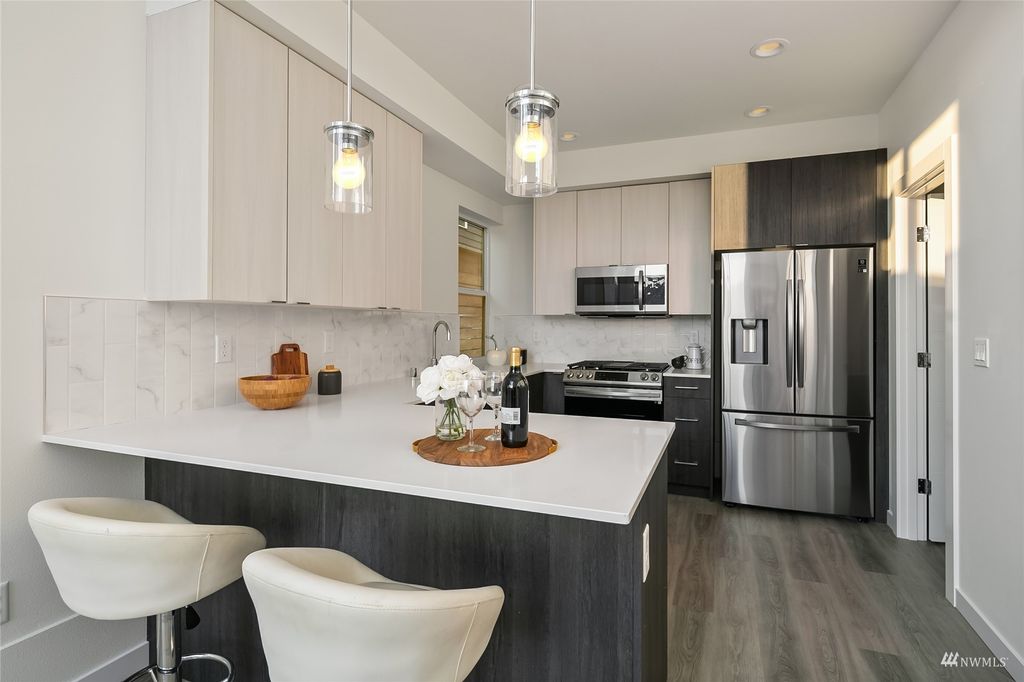 Photo of 12004 31st Avenue NE, Seattle, WA 98125 (MLS # 1988932)