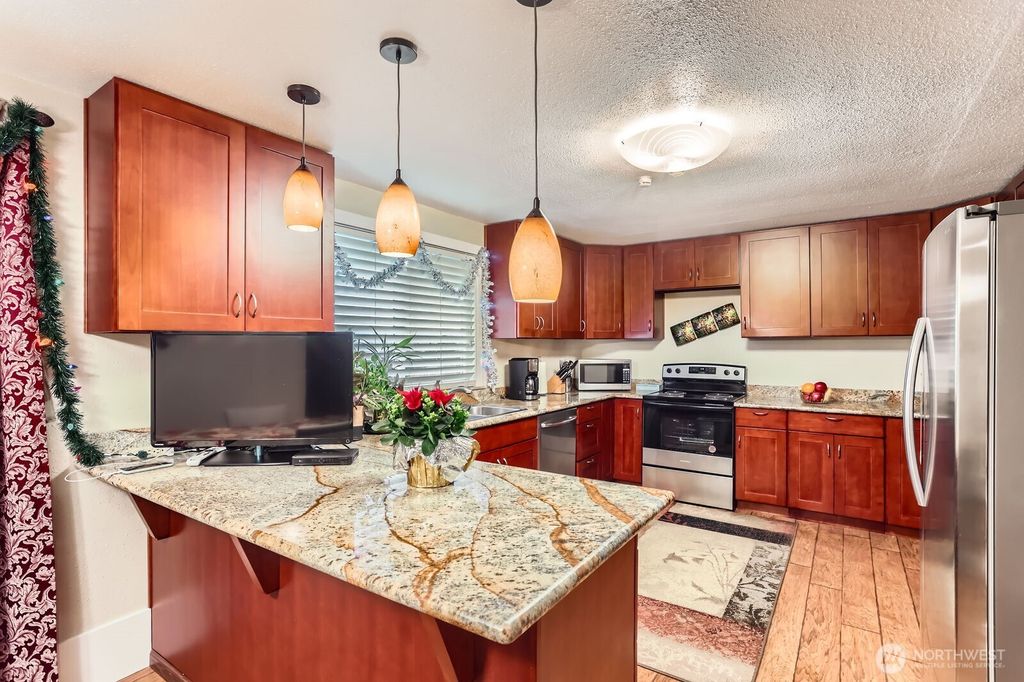 Photo of 8707 113th Avenue SE, Newcastle, WA 98056 (MLS # 2374701)