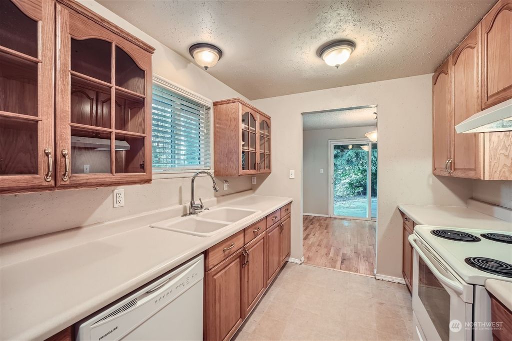 Photo of 20111 1st Place S, Des Moines, WA 98198 (MLS # 2216809)