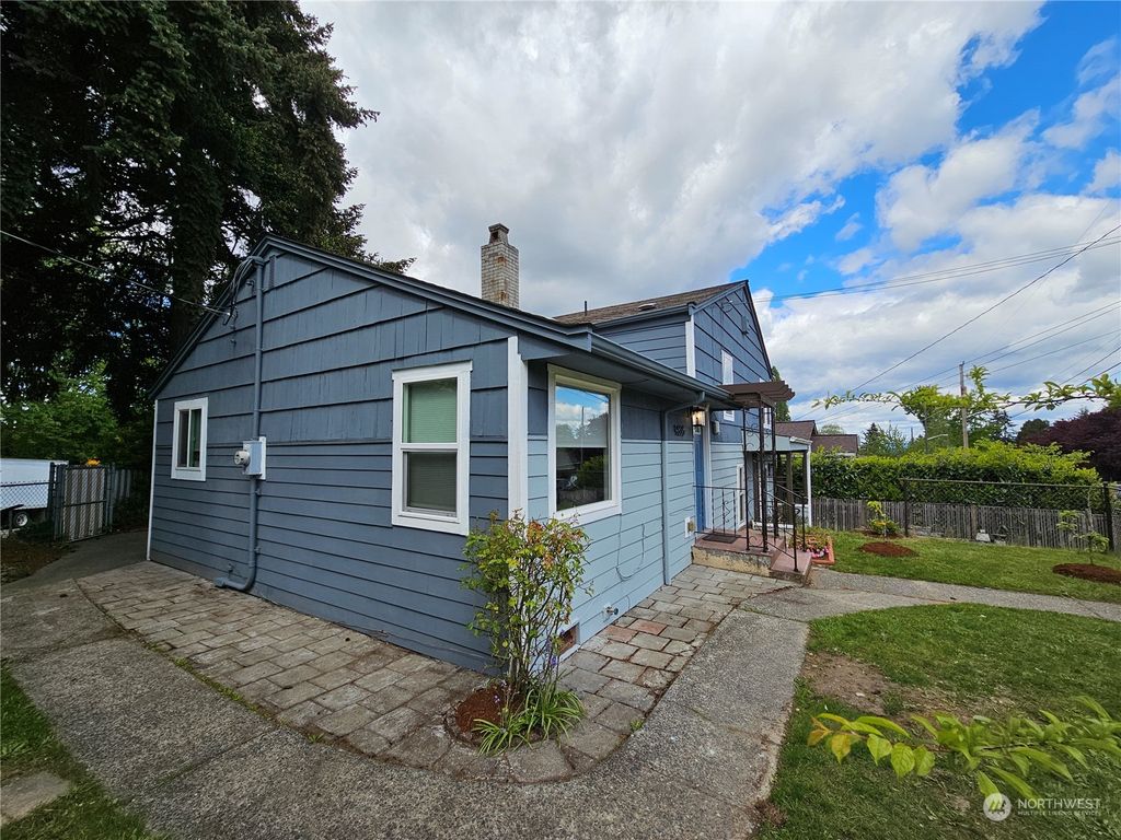 Photo of 9835 57th Avenue S, Seattle, WA 98118 (MLS # 2320704)