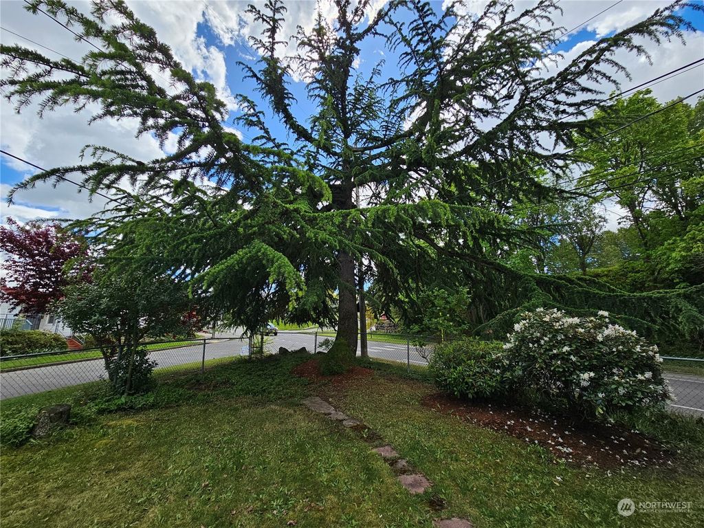 Photo of 9835 57th Avenue S, Seattle, WA 98118 (MLS # 2320704)