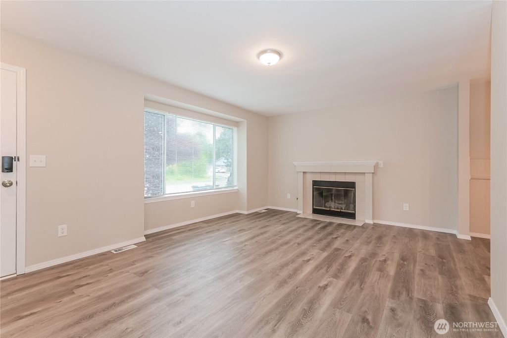 Photo of 411 96TH Avenue SE, Lake Goodwin, WA 98258 (MLS # 2557733)