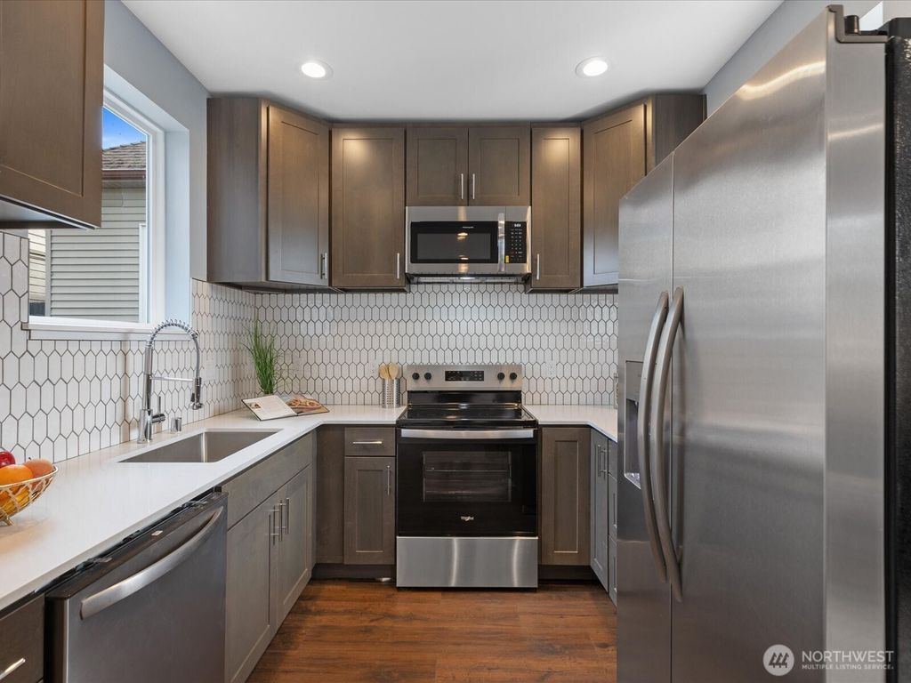Photo of 6751 14th Avenue NW, Seattle, WA 98117 (MLS # 2422754)