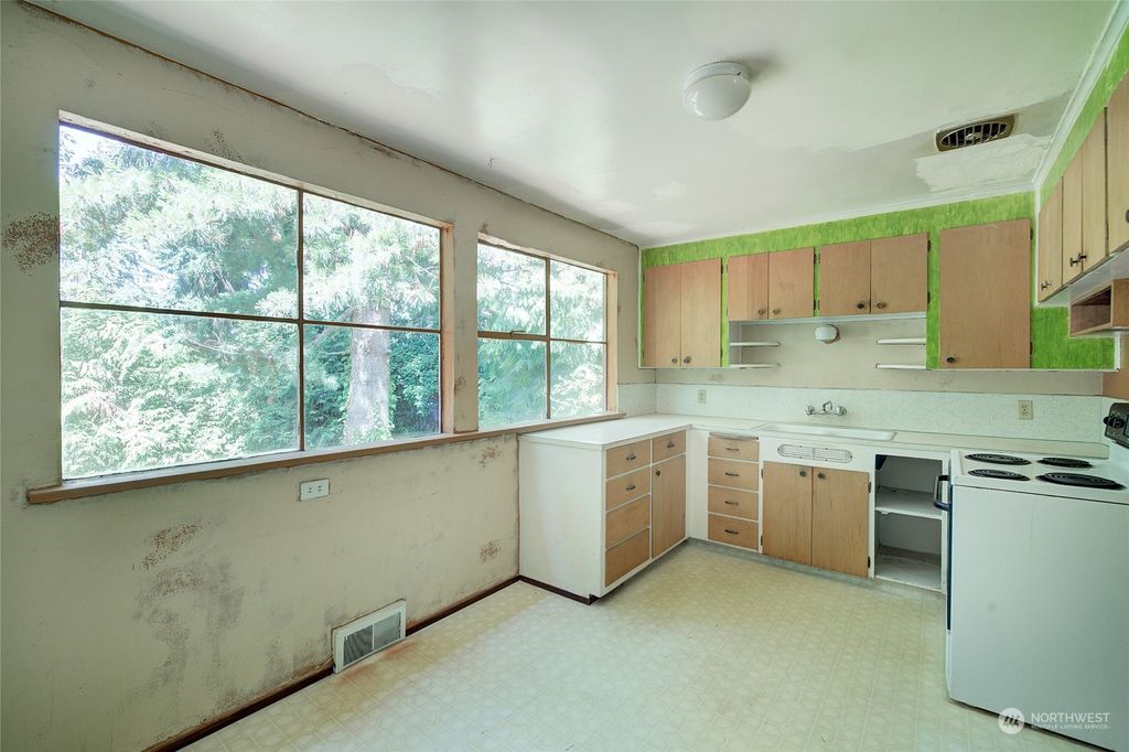 Photo of 14007 23rd Avenue NE, Seattle, WA 98125 (MLS # 2136542)