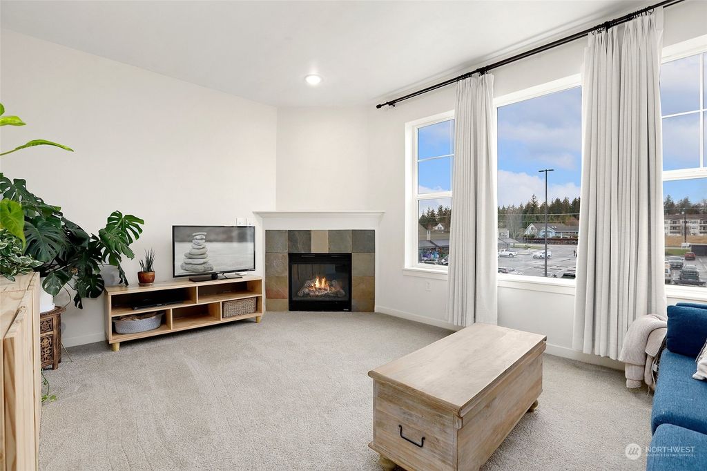 Photo of 7104 265th Street NW #317, Stanwood, WA 98292 (MLS # 2039170)