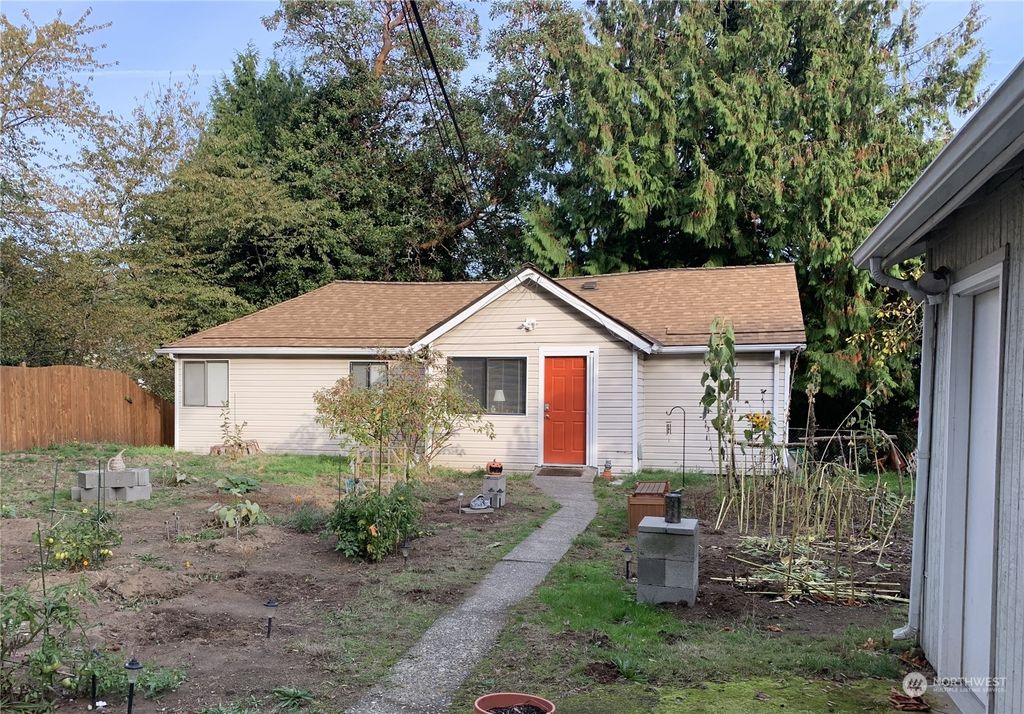 Photo of 10928 26th Avenue SW, Seattle, WA 98146 (MLS # 2301499)