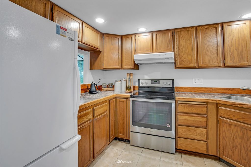 Photo of 15254 Sunwood Boulevard #E22, Tukwila, WA 98188 (MLS # 1955531)