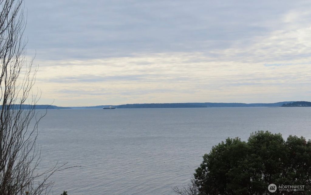 Photo of 2400 Perkins Lane W, Seattle, WA 98199 (MLS # 2426771)