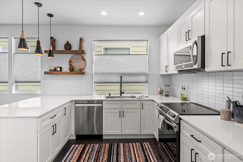 Photo of 6055 7th Avenue NW, Seattle, WA 98107 (MLS # 2379726)