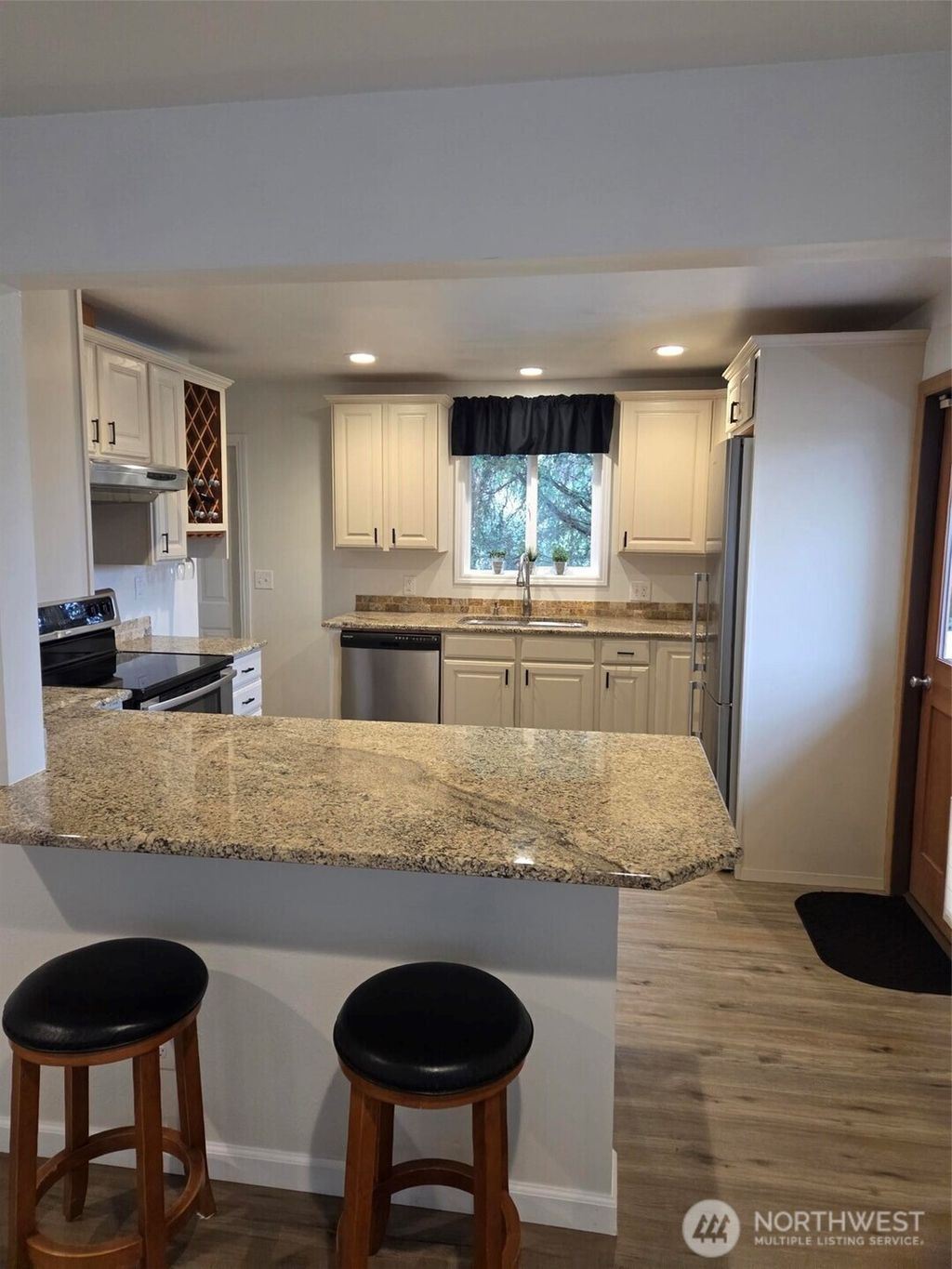 Photo of 4738 Rucker Avenue, Everett, WA 98203 (MLS # 2440256)