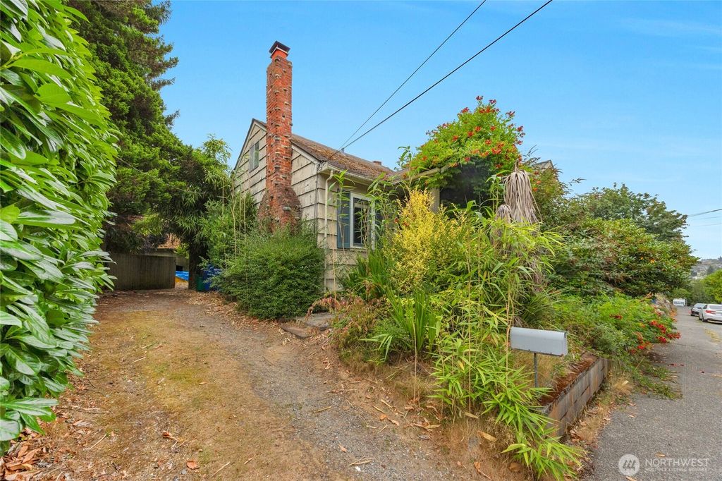 Photo of 4563 34th Avenue W, Seattle, WA 98199 (MLS # 2420852)