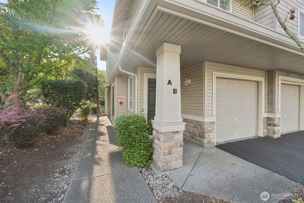 Photo of 6121 Hazel Avenue SE #A4, Auburn, WA 98092 (MLS # 2392468)
