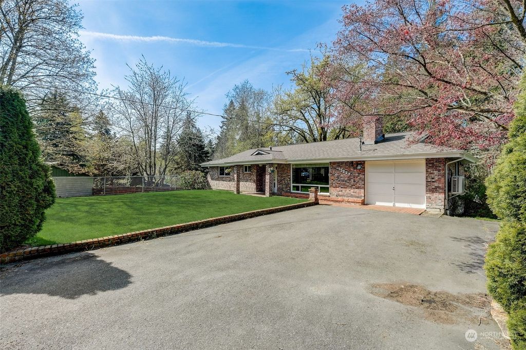 Photo of 13227 Lake Kathleen Road SE, Renton, WA 98059 (MLS # 2221526)