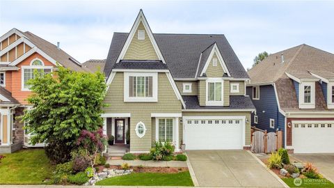 Photo of 1829 SE 8th Place, Renton, WA 98057 (MLS # 2537212)