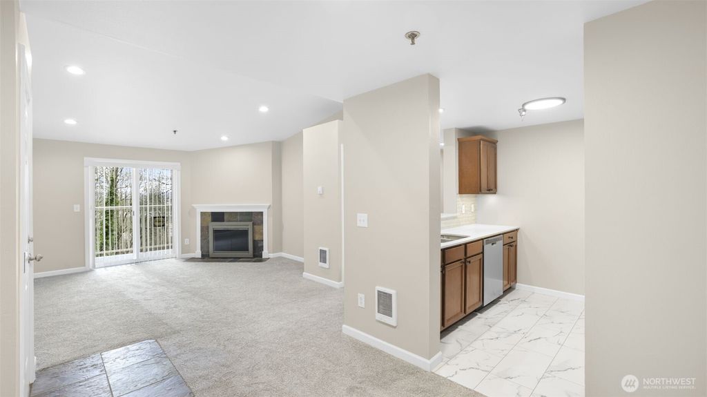 Photo of 975 Aberdeen Avenue NE #E-407, Renton, WA 98056 (MLS # 2347989)