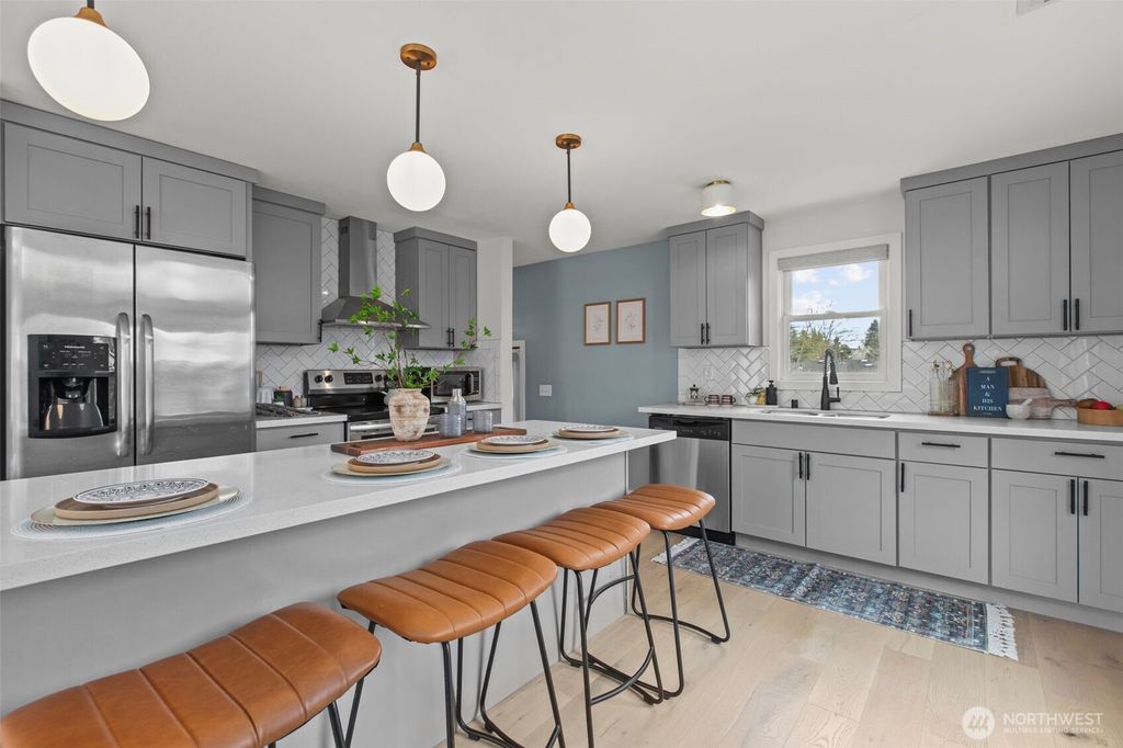 Photo of 4707 S Brandon Street, Seattle, WA 98118 (MLS # 2514196)