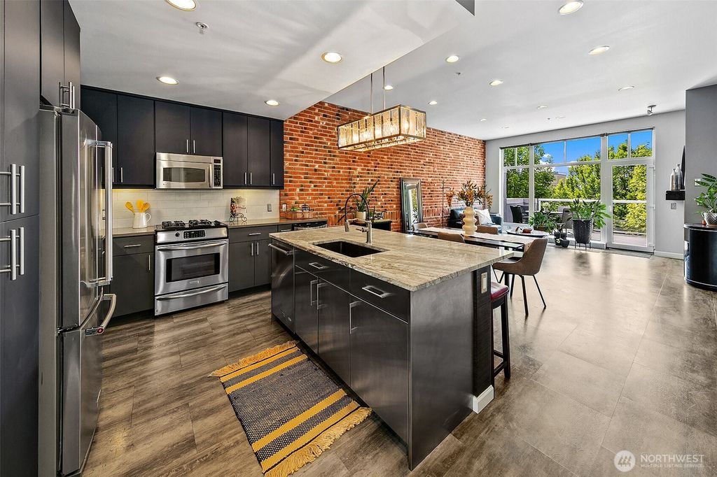 Photo of 17 W Mercer Street #302, Seattle, WA 98119 (MLS # 2439018)