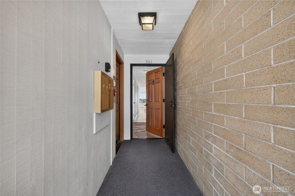 Photo of 3608 26th Place W #301, Seattle, WA 98199 (MLS # 2580960)
