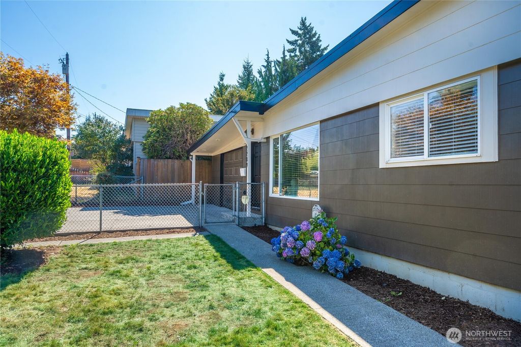 Photo of 2209 NE 9th Street, Renton, WA 98056 (MLS # 2414120)