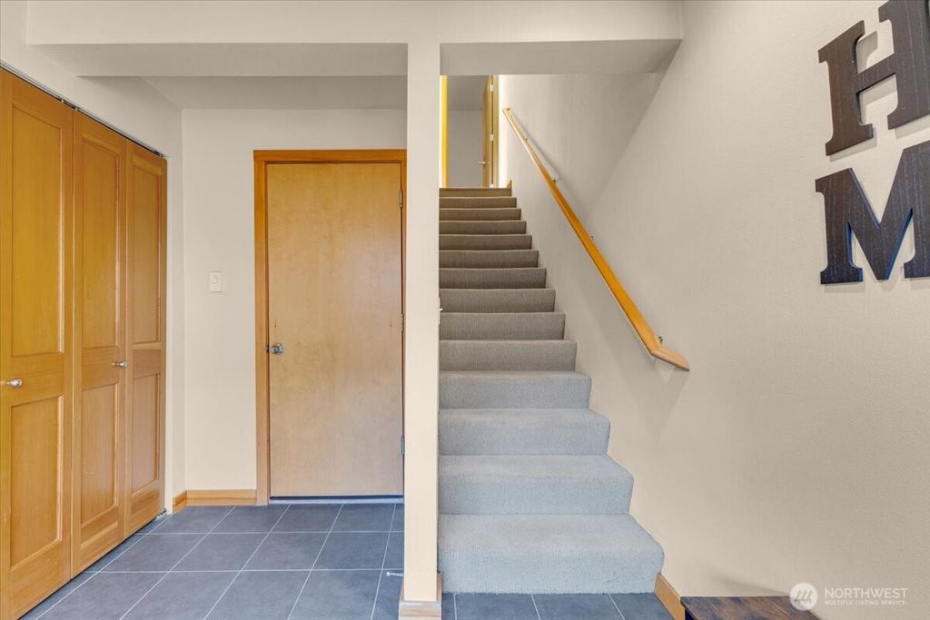 Photo of 1719 SW Henderson Street, Seattle, WA 98106 (MLS # 2438049)