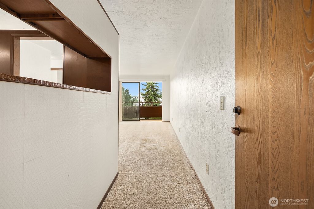 Photo of 2100 N 106th Street #402, Seattle, WA 98133 (MLS # 2429029)