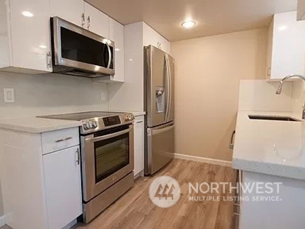 Photo of 5706 123rd Avenue SE, Bellevue, WA 98006 (MLS # 2136395)