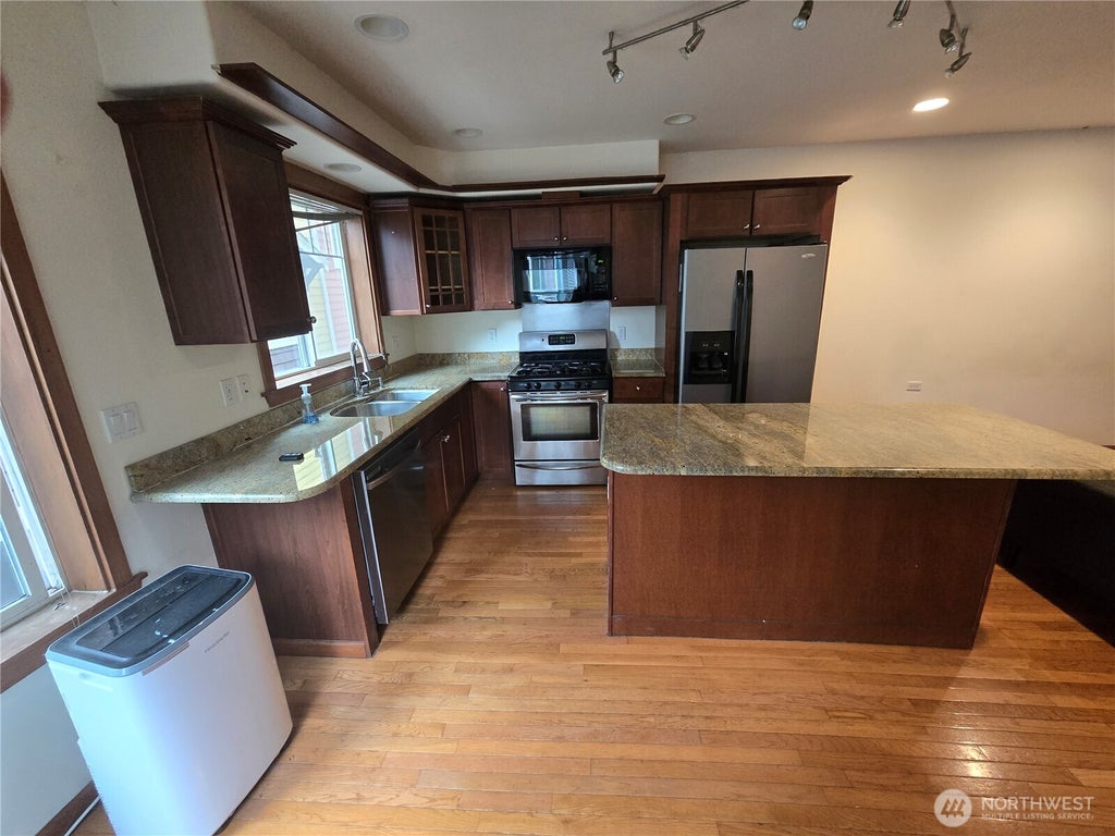 Photo of 6819 Weedin Place NE, Seattle, WA 98115 (MLS # 2582213)