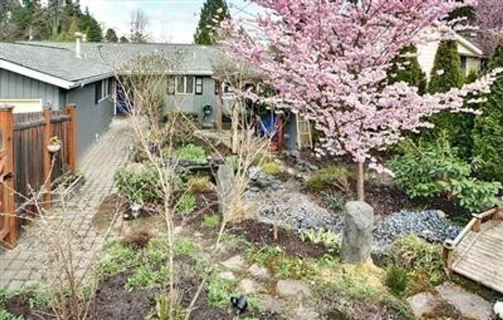 Photo of 9240 Sand Point Way NE, Seattle, WA 98115 (MLS # 2479819)