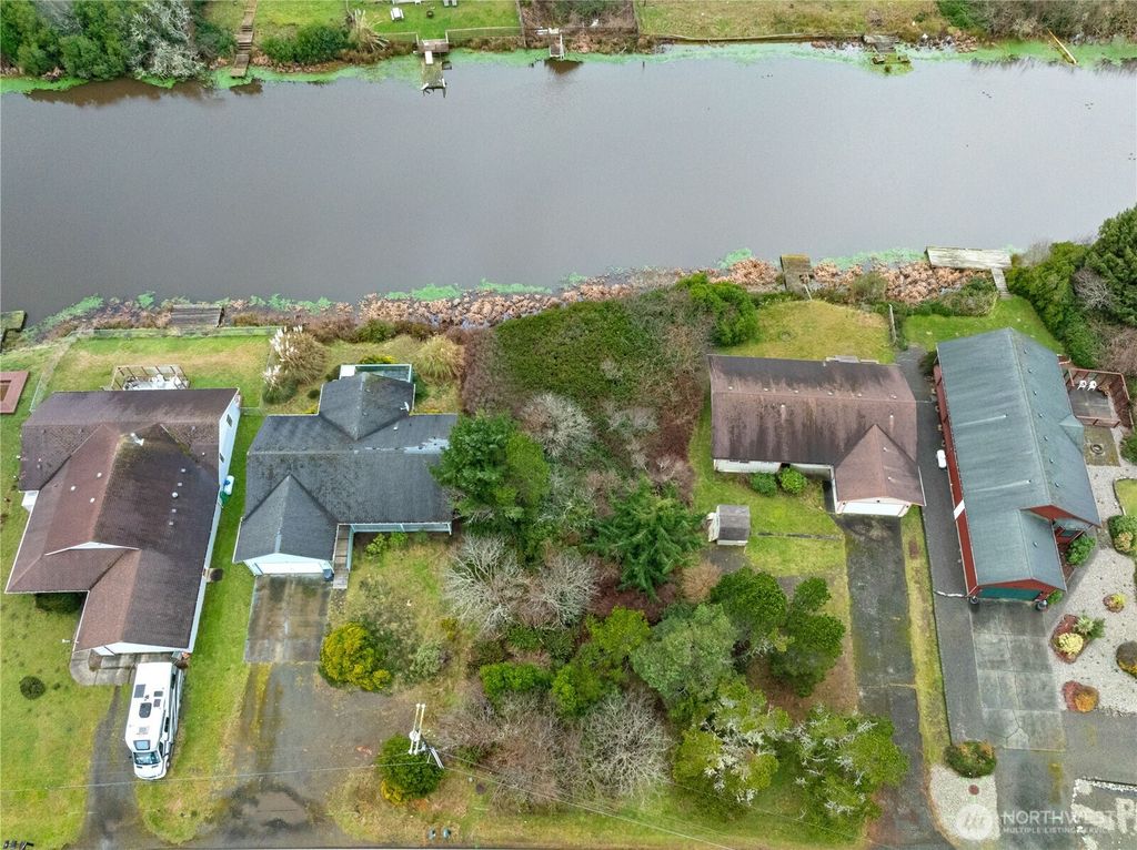 Photo of 569 Canal Drive NE, Ocean Shores, WA 98569 (MLS # 2483972)