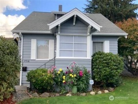Photo of 7716 13th Avenue SW, Seattle, WA 98106 (MLS # 2446553)