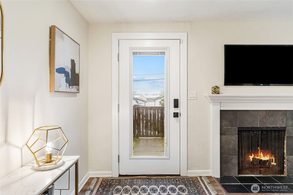 Photo of 9018 14th Avenue SW, Seattle, WA 98106 (MLS # 2458442)