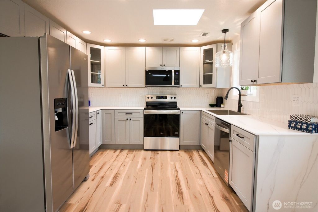 Photo of 704 NE Normandy Dr, Bremerton, WA 98310 (MLS # 2478743)