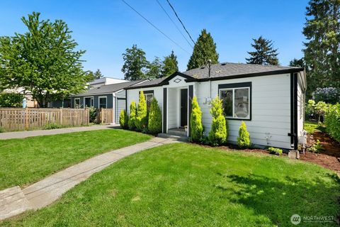 Photo of 9032 15th Avenue SW, Seattle, WA 98106 (MLS # 2521718)
