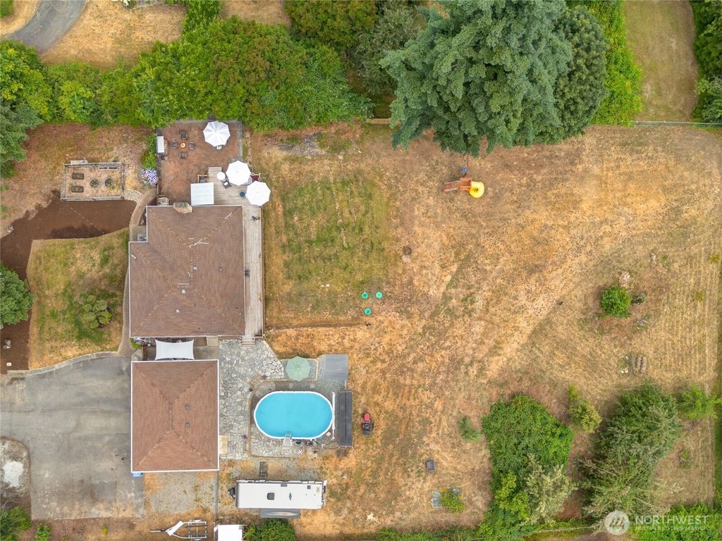 Photo of 8603 Woodland Avenue E, Puyallup, WA 98371 (MLS # 2483157)