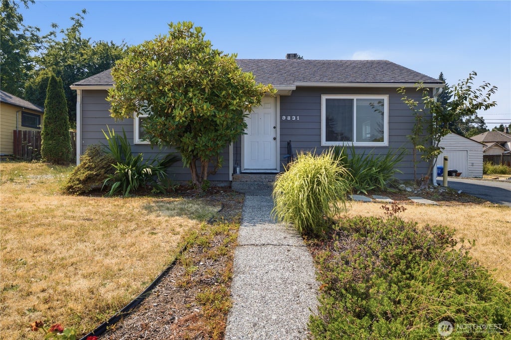 Photo of 9831 33rd Avenue SW, Seattle, WA 98126 (MLS # 2564311)
