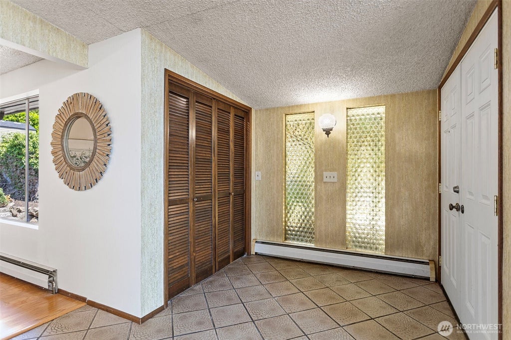 Photo of 5210 S Kenyon Street, Seattle, WA 98118 (MLS # 2532308)