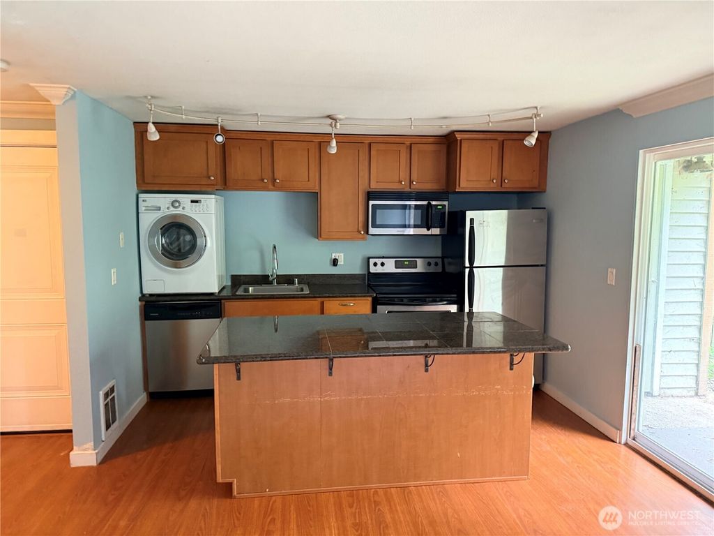 Photo of 23453 16th Avenue S #A-102, Des Moines, WA 98198 (MLS # 2507817)