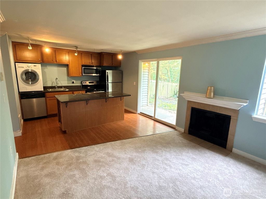 Photo of 23453 16th Avenue S #A-102, Des Moines, WA 98198 (MLS # 2507817)