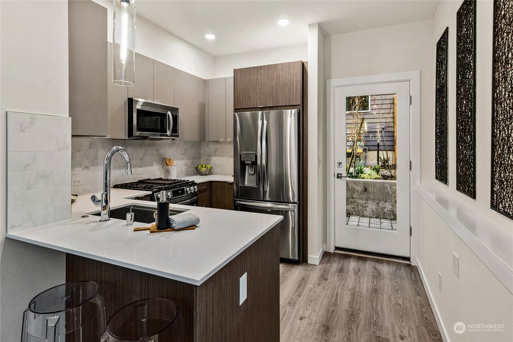 Photo of 1030 C NE 70th Street, Seattle, WA 98115 (MLS # 2039531)