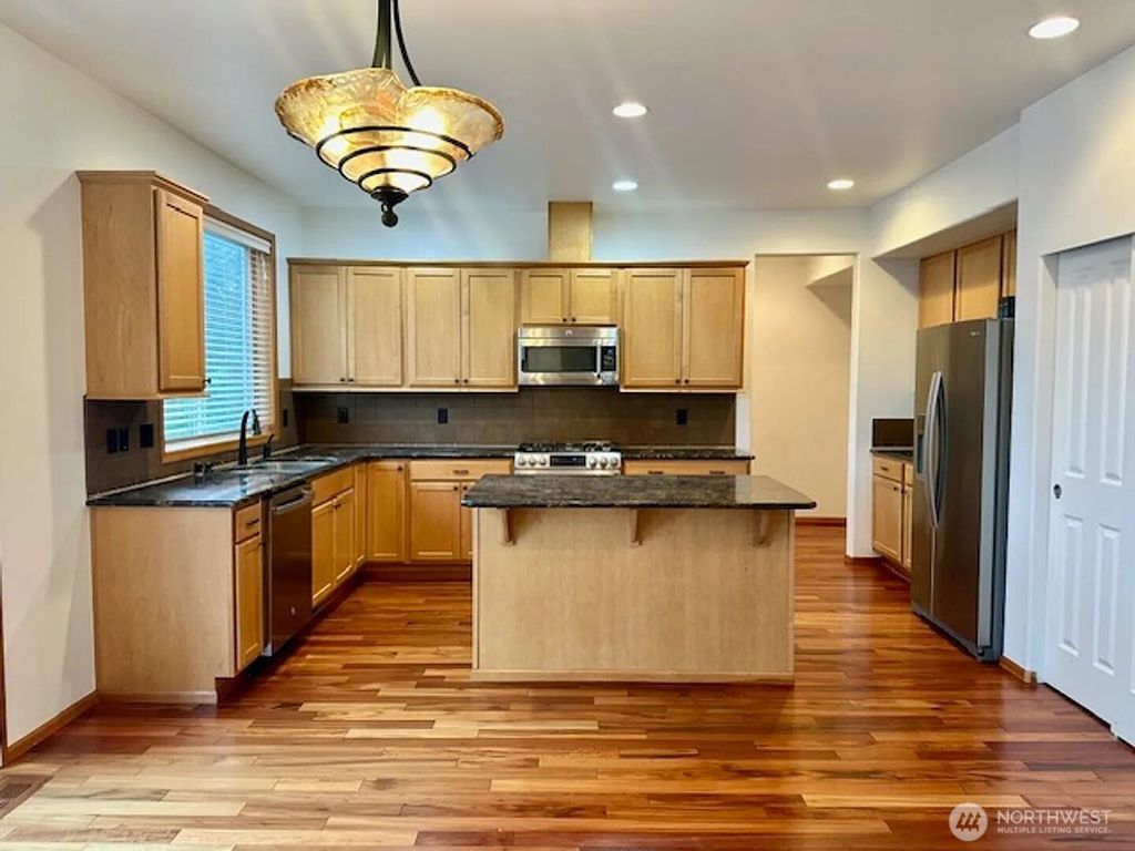 Photo of 2013 NE 27th Street, Renton, WA 98056 (MLS # 2332621)
