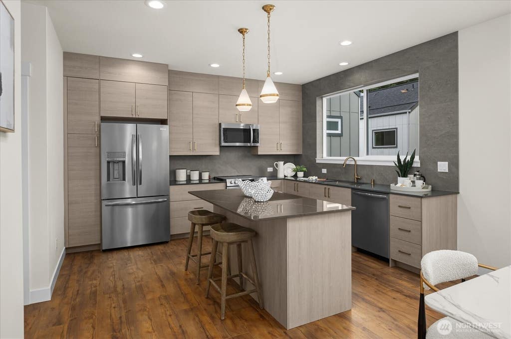Photo of 10330 Ashworth Avenue N, Seattle, WA 98133 (MLS # 2538101)