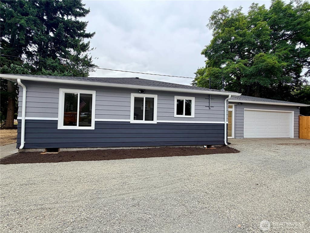 Photo of 2405 NE 10th Street, Renton, WA 98056 (MLS # 2561023)
