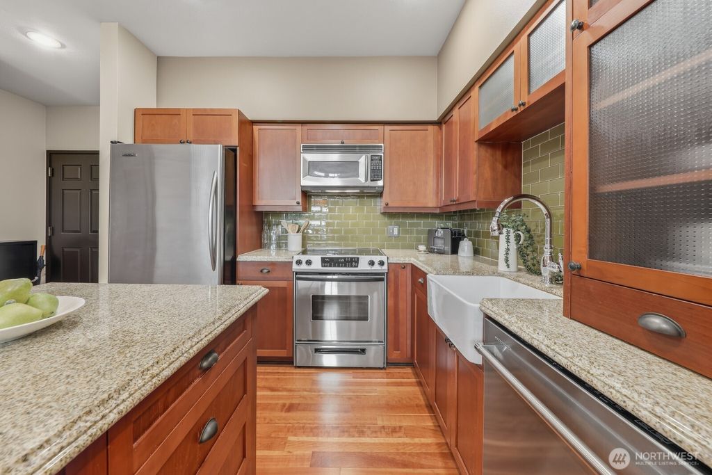 Photo of 201 Galer Street #102, Seattle, WA 98109 (MLS # 2442785)