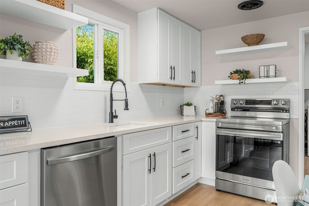 Photo of 724 N 104th Street, Seattle, WA 98133 (MLS # 2447636)