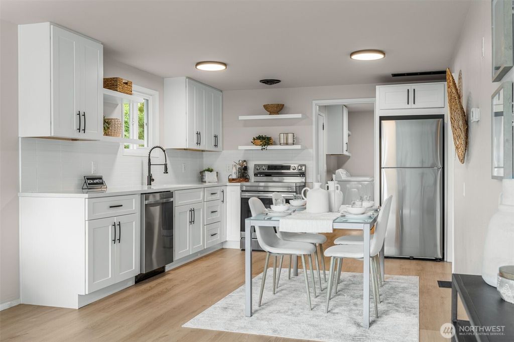 Photo of 724 N 104th Street, Seattle, WA 98133 (MLS # 2447636)