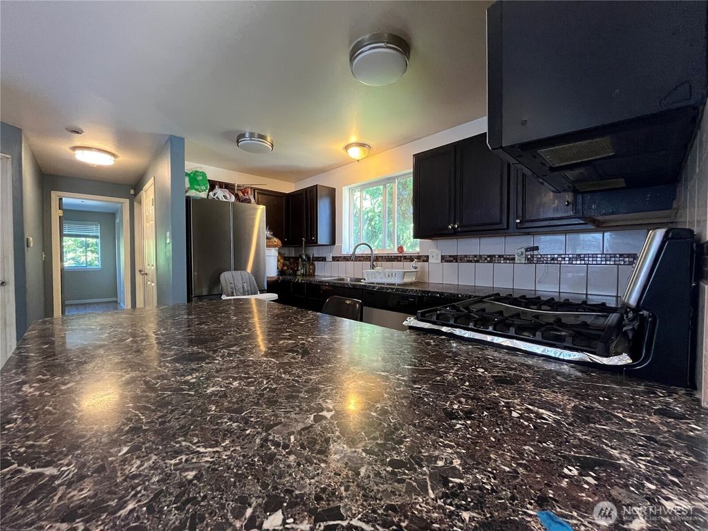 Photo of 10453 1st Avenue SW, Seattle, WA 98146 (MLS # 2550201)