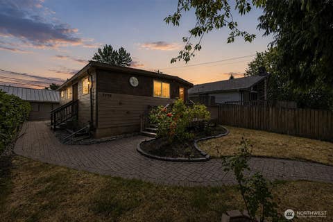 Photo of 7768 14th Avenue SW, Seattle, WA 98106 (MLS # 2573159)