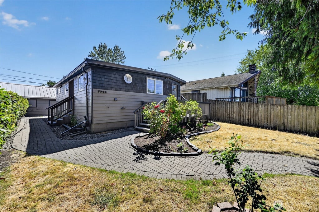 Photo of 7768 14th Avenue SW, Seattle, WA 98106 (MLS # 2573159)